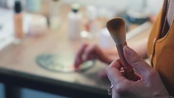 Precision tools shape her brows, defining her expression with subtle elegance video