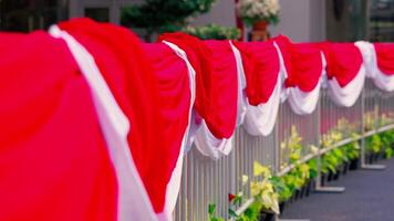 Festive Railing Draped in Red and White Fabric video