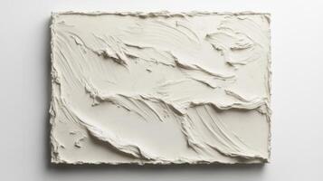 A white piece of art on a white surface photo