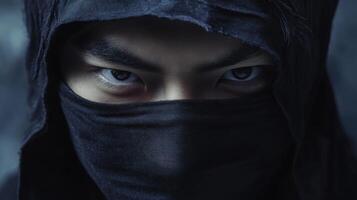 Intense Gaze of a Ninja Warrior Hidden in Shadows Mysterious and Powerful photo