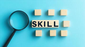 Skill word and wooden blocks on blue background photo