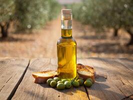 A bottle of olive oil and bread on a table photo