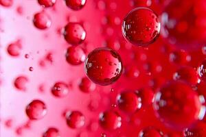 A close up of bubbles in red liquid photo