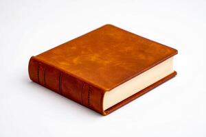 A brown leather book on a white background photo