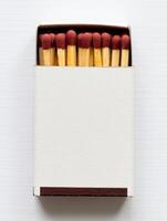 matchstics in a box on a white background photo