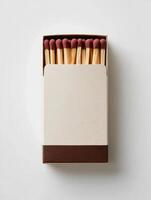 Box of Matches Standing Upright on White Surface photo