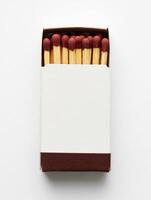 A box of matches on a white surface photo