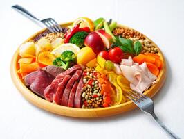 A plate of food with meat, vegetables and fruit photo