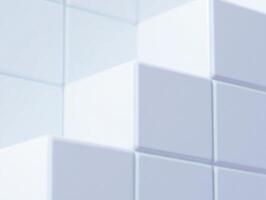 A white wall with many white cubes photo