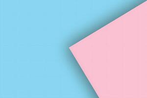 A pink and blue paper with a triangle on it photo