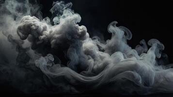 Smoke is being blown into the air on a black background photo