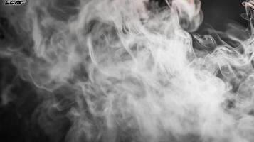 Swirling white smoke on dark background photo