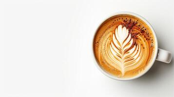 A cup of coffee with a leaf design on top photo