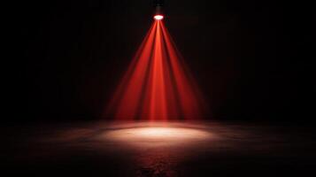 Red spotlight on a dark floor with a spotlight photo