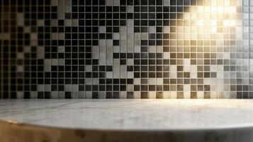 A white marble counter with a black and white mosaic tile wall photo