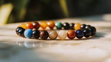 A bracelet with multi colored stones on it photo
