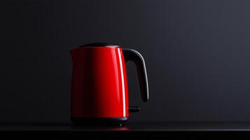 Sleek red electric kettle on dark surface photo