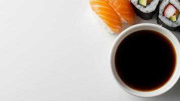 Sushi and soy sauce on white background photo