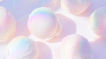 A group of white eggs with rainbow colored icing photo