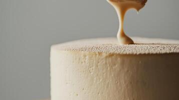 Delicious creamy cake layering process in a minimalist studio photo