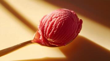 A spoon with a scoop of ice cream on top photo
