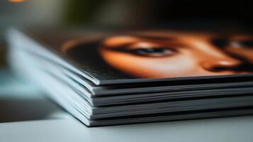 A stack of magazines with a woman's face on it photo