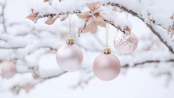 Christmas decorations on a tree in the snow photo