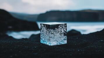 Recycled Plastic Cube on Dark Surface photo