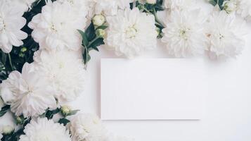 White flowers and blank card on white background photo