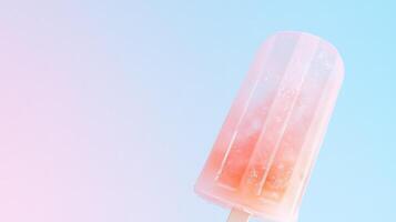 orange popcicle on gradient pastel background photo