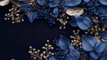 Blue and gold leaves on a black background photo