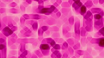 Pink red abstract shapes create a blurred textured background suitable for artistic designs colorful projects backgrounds web banners or packaging design video