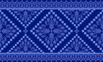a detailed pattern composed of pixel designs with light blue flowers on dark blue background , design for fabric or various pattern printing works. vector