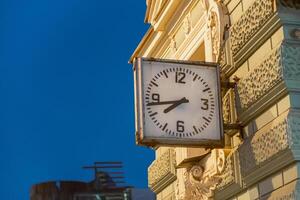 Clock on historic building in St. Petersburg captures evening light and reflects local architecture photo