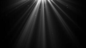 Soft Light Rays Overlaying Particle Animation on a Black Background video