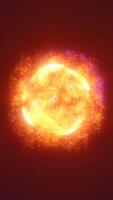 Exploding glowing particles forming a fiery orb, with bursts of orange and violet light in a cosmic environment video