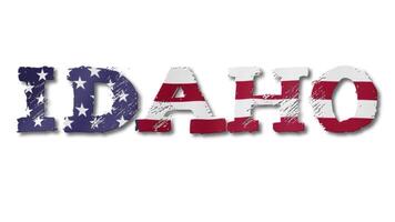 Idaho Text with USA Flag Waving Inside. Seamless Loop Animation on Transparent Background. video
