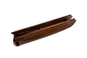 firearm forend component with fine grip texture close-up photo