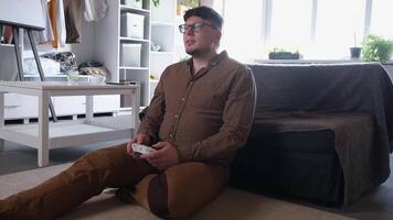 man playing games using controller video