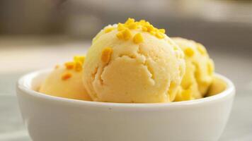 Vanilla Ice Cream Scoops in White Bowl photo