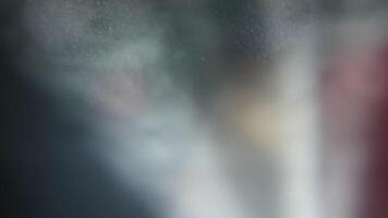 Abstract blurred light and color pattern with soft glow, dreamy background texture with silver particles and smooth transitions of shades and highlights video