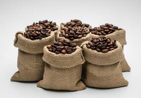 Group of Burlap Sacks Filled with Coffee Beans photo