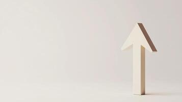 Arrow pointing upward on grey background, symbolizing growth, progress, and positive direction photo