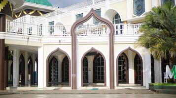 Mosque Entrance Architecture with Arched Windows photo