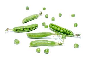 Pods of green peas on a white background photo