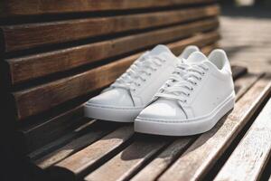 White sneakers on a bench photo