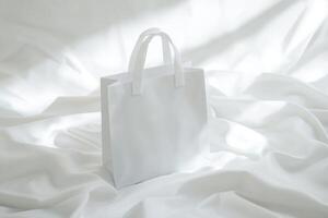 White paper bag on white background photo