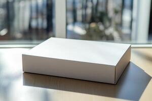 White box mockup on wooden table with sunlight photo
