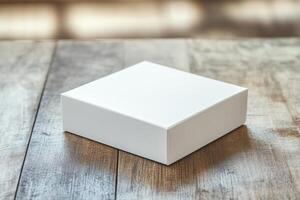 White box on wooden table with copy space photo