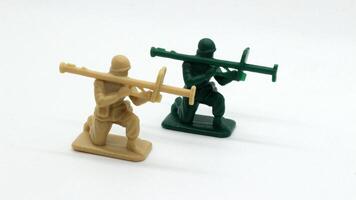 9. Plastic soldier toy holding weapon isolated photo